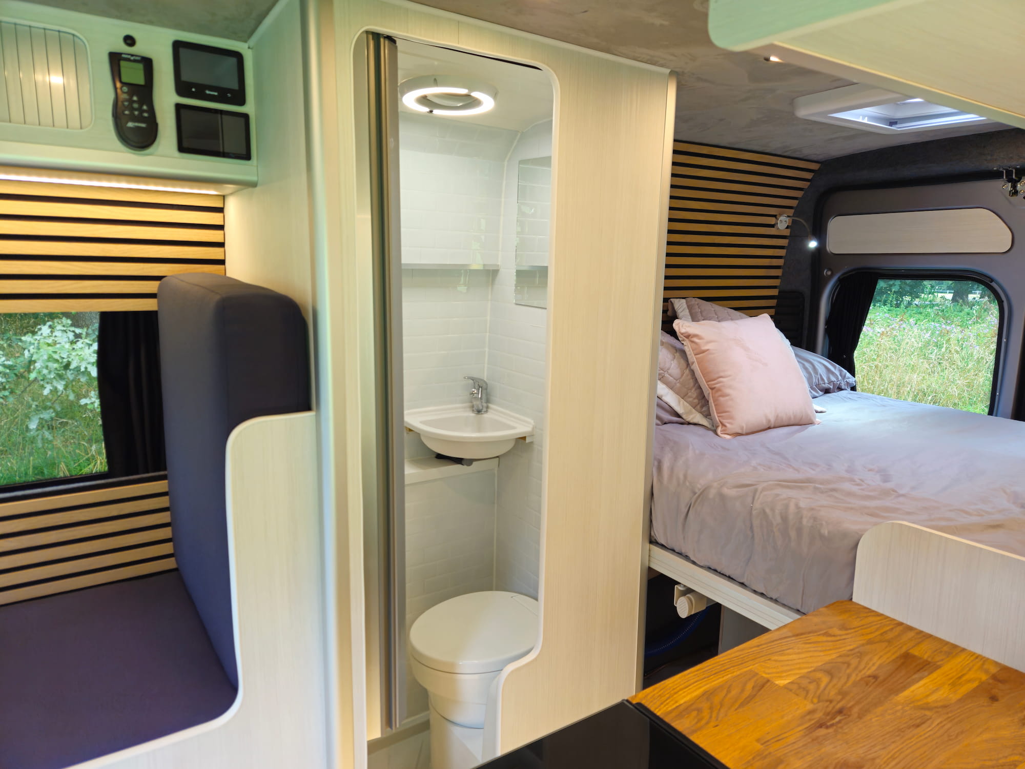 Internal shower and washroom in a Citroën Relay off-grid campervan conversion